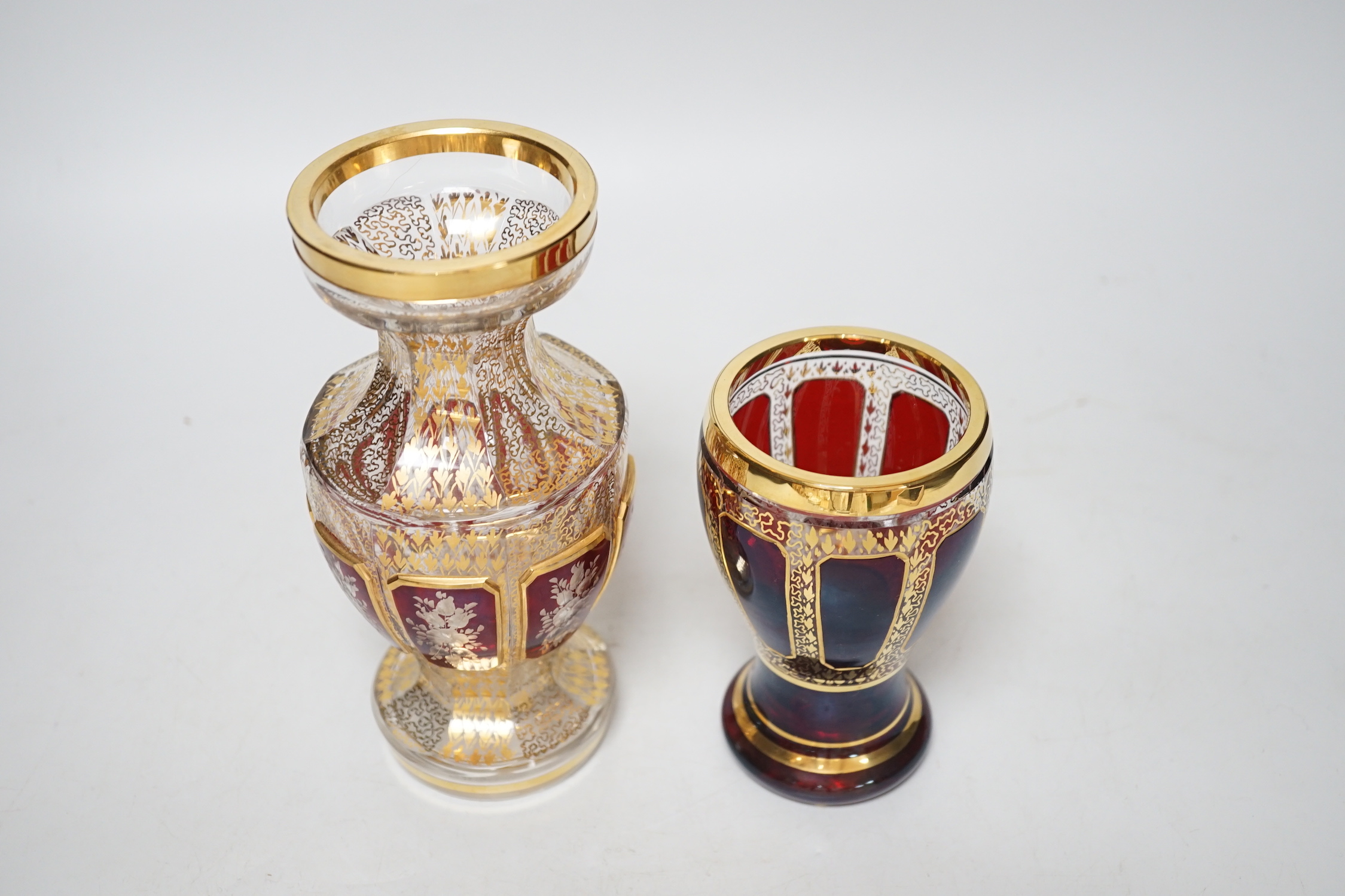 Two German gilt-decorated ruby flashed glass vases, 18cm high